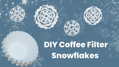 DIY Coffee Filter Snowflakes on blue background