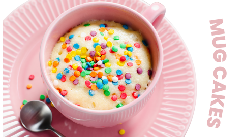 Vanilla mug cake with sprinkles in a pink tea cup with plate